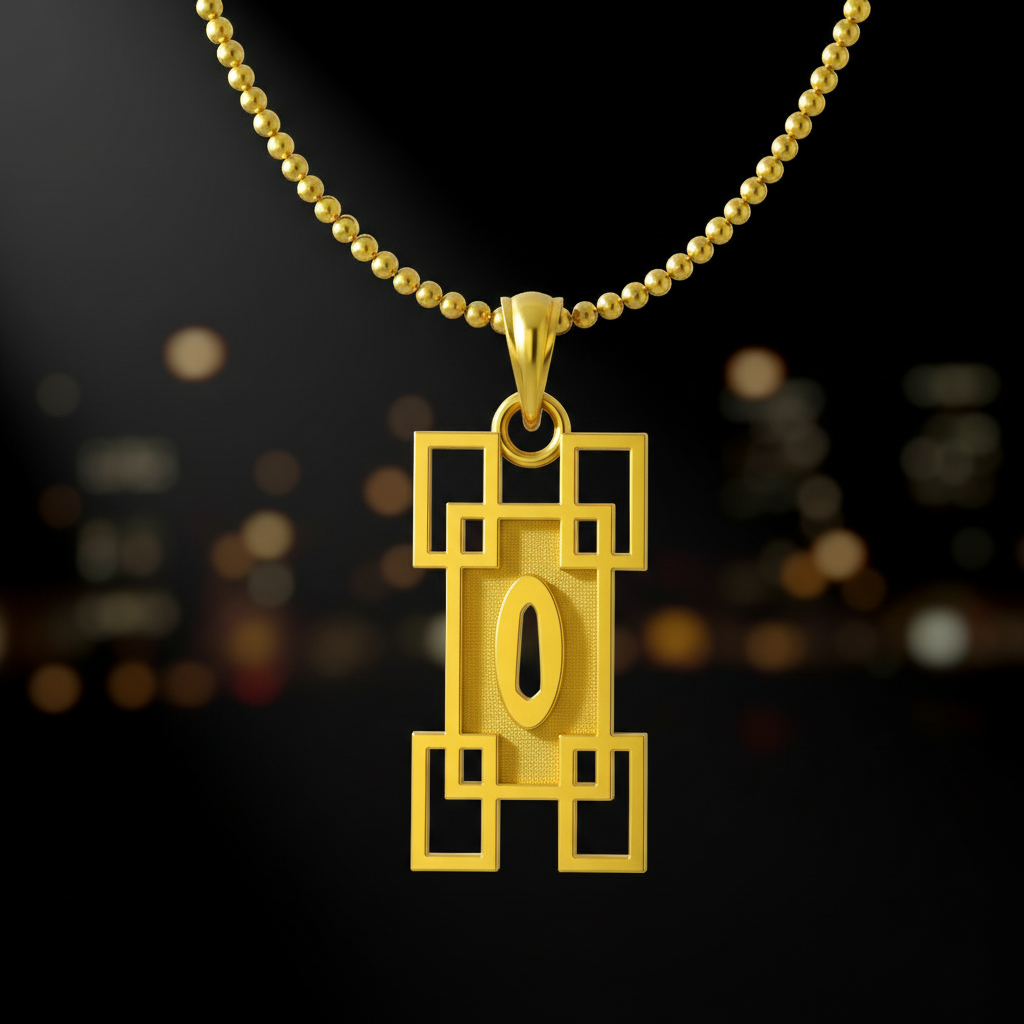 Gold pendant with geometric design on a blurred natural background