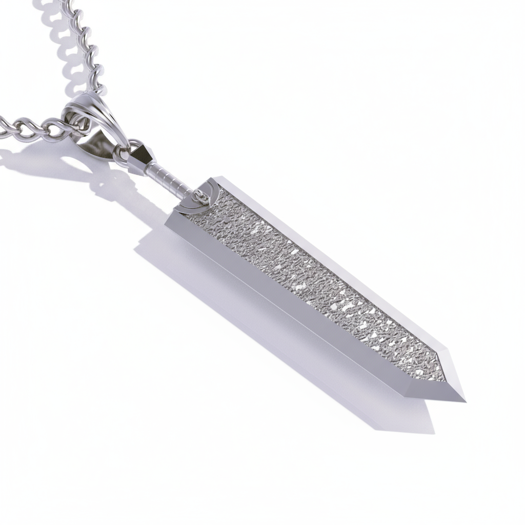Silver pendant with a textured design on a white background