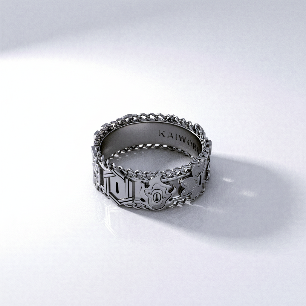 Silver ring with intricate designs on a white background