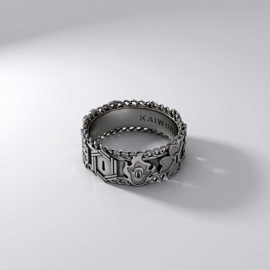 Silver ring with intricate designs on a white background