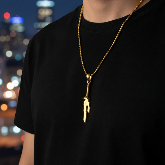 Person wearing a black shirt with a gold necklace featuring a unique pendant against a cityscape background.