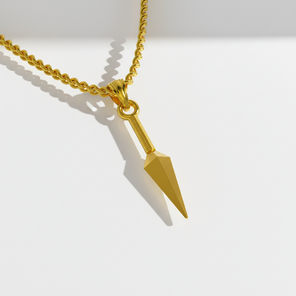 Gold necklace with a spearhead pendant on a white background