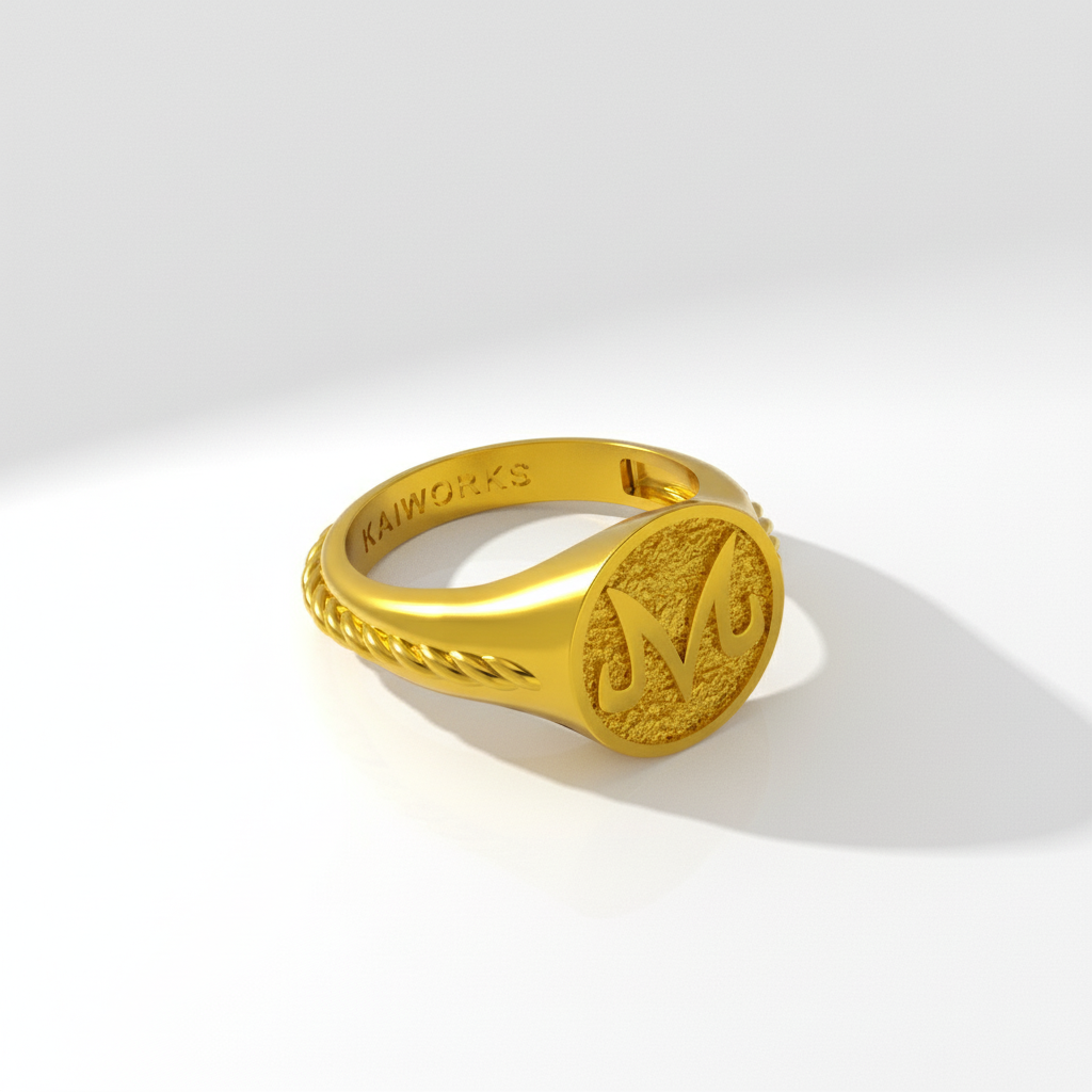 Gold ring with a monogram on a white background