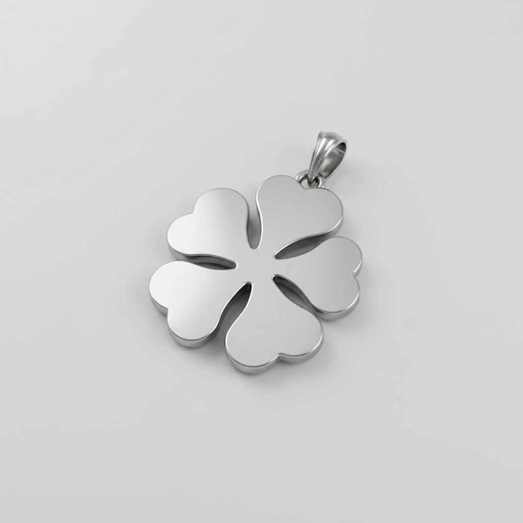 Silver four-leaf clover pendant on a light gray background
