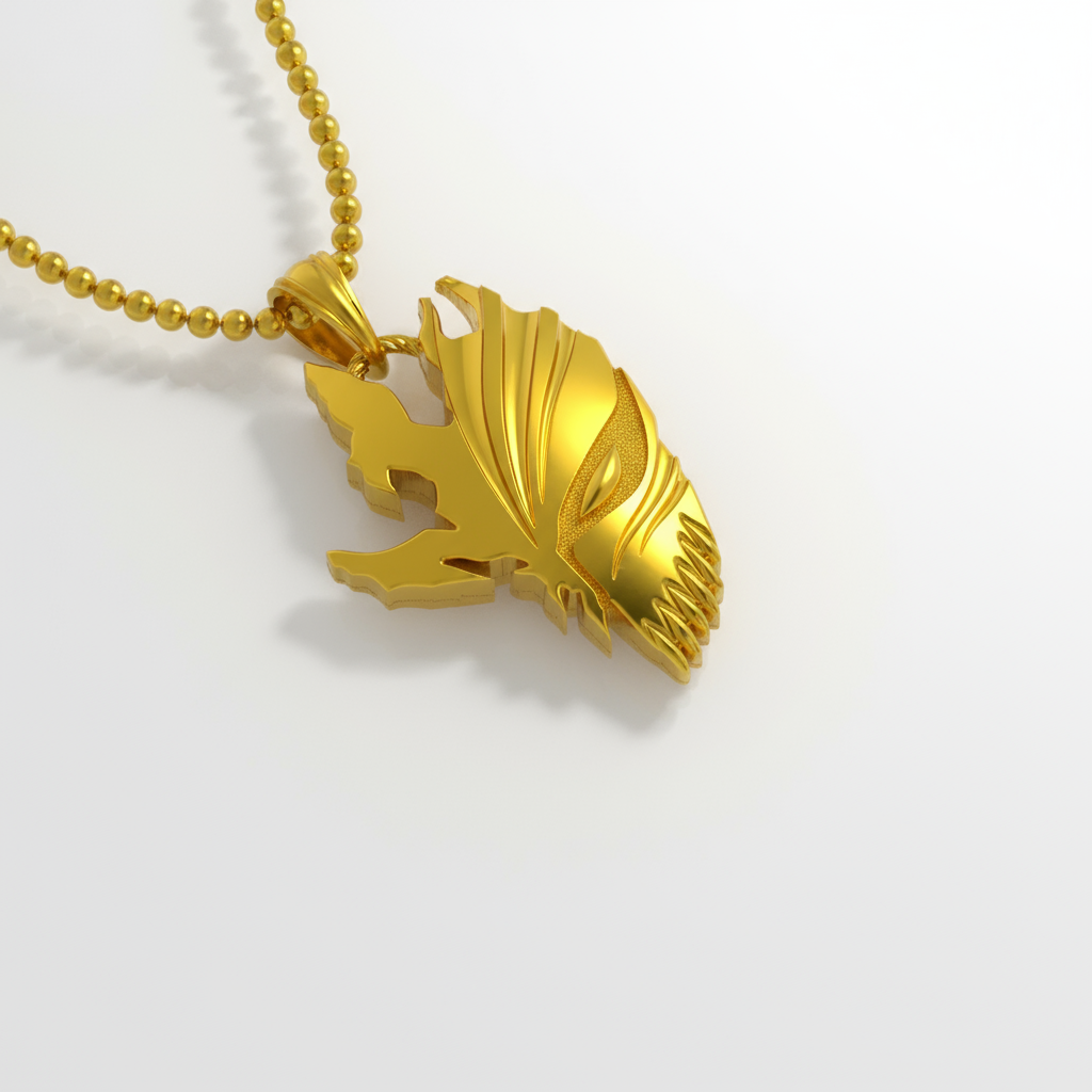 Gold feather-shaped pendant on a white background