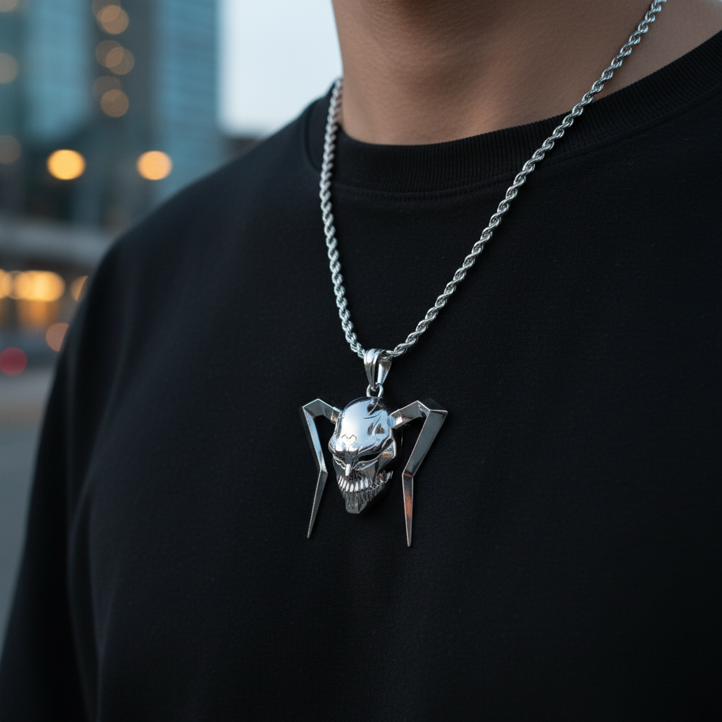 Full Hollow Mask pendant in sterling silver worn on a person's neck, showcasing intricate design and style.