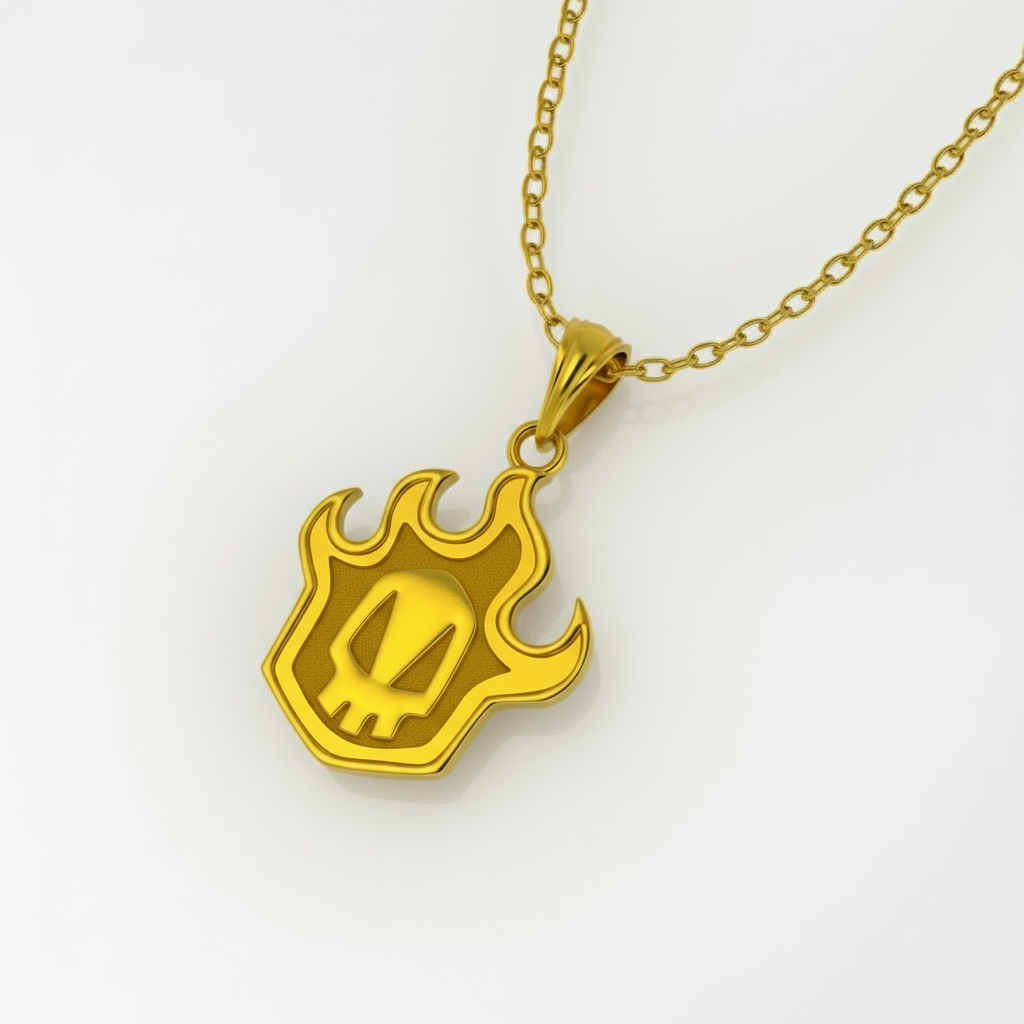 Gold pendant with a flame design on a white background