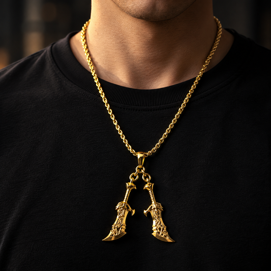 Man wearing a black t-shirt with a gold necklace featuring a pendant.