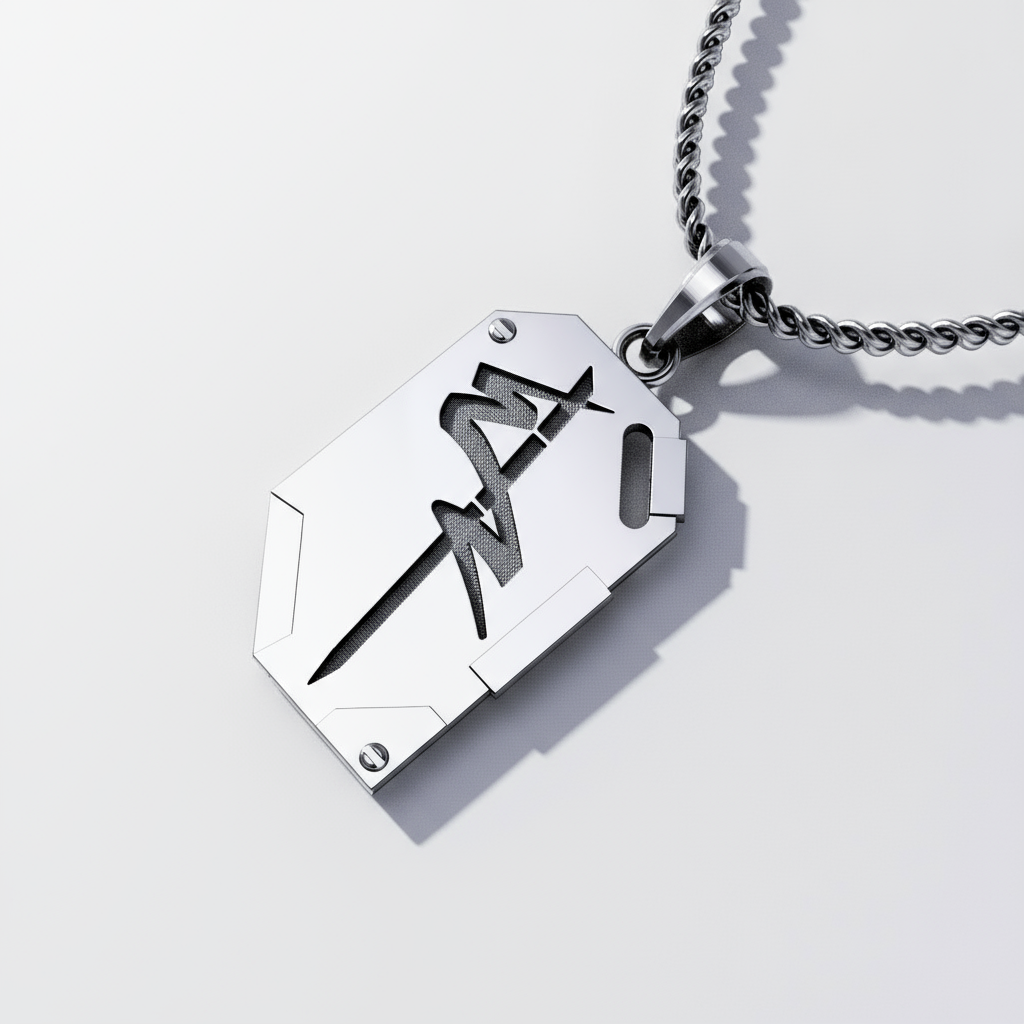 Silver pendant with engraved design on a light gray background