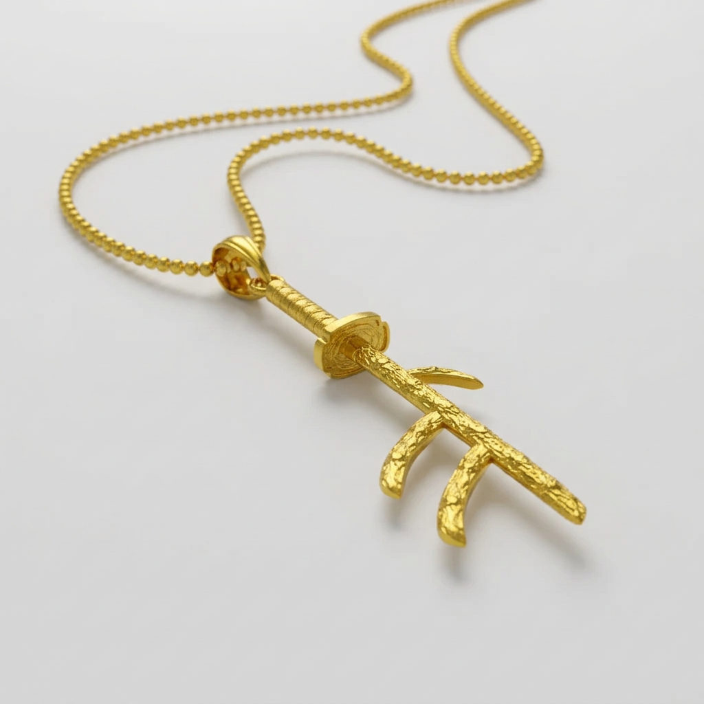 Gold branch-shaped pendant on a white background