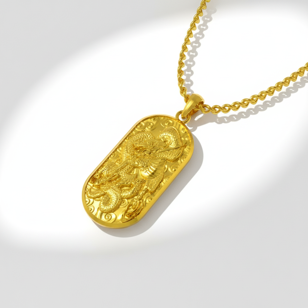 A 14K gold Japanese dragon pendant with intricate details, displayed on a wooden surface with a green leafy background.