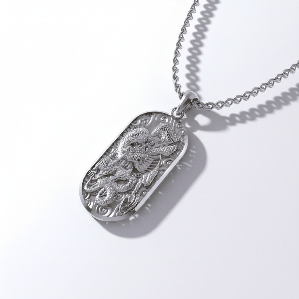 A 14K gold Japanese dragon pendant with intricate details, displayed on a wooden surface with a green leafy background.