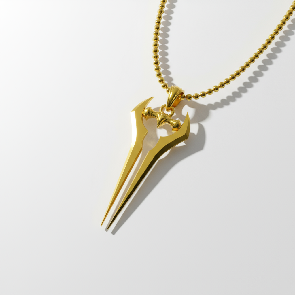 Gold necklace with a unique pendant on a white background