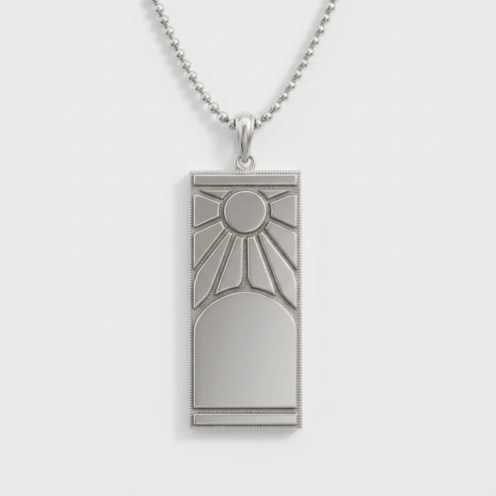 Silver pendant necklace with geometric design on a light gray background