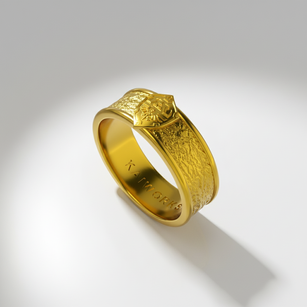 Gold ring with intricate design on a white background