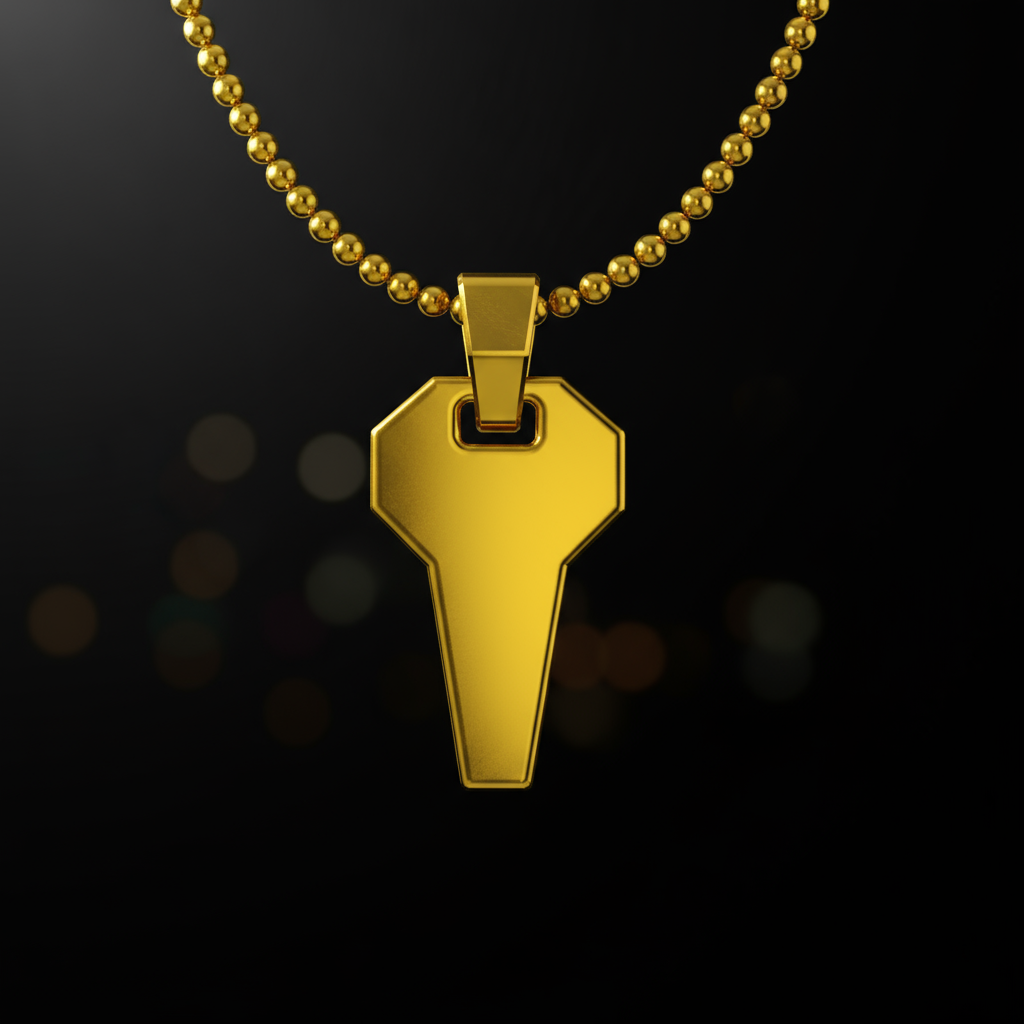Gold key-shaped pendant on a black background
