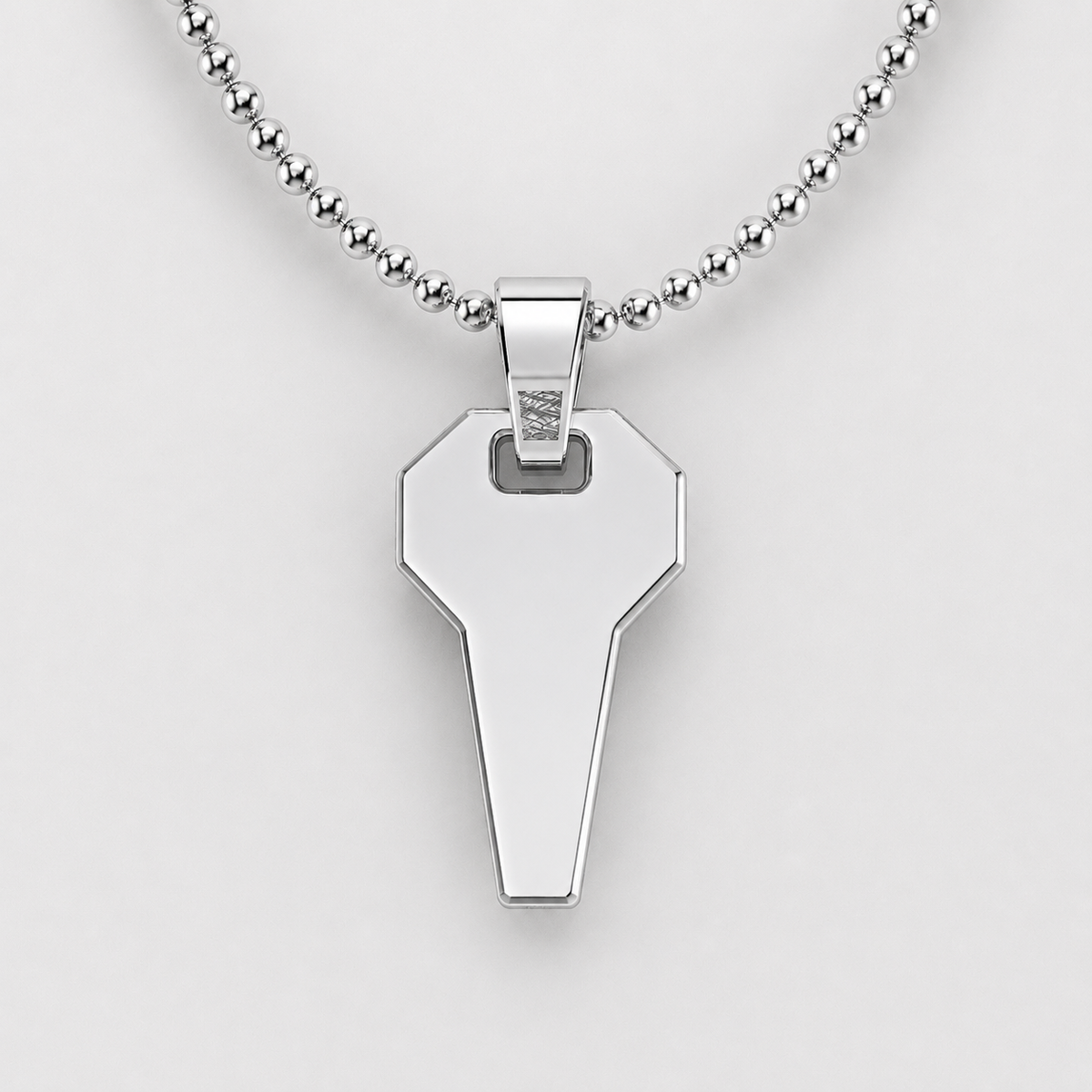 David Martinez Pendant in 14K Gold on a silver chain, showcasing a sleek key pendant design.