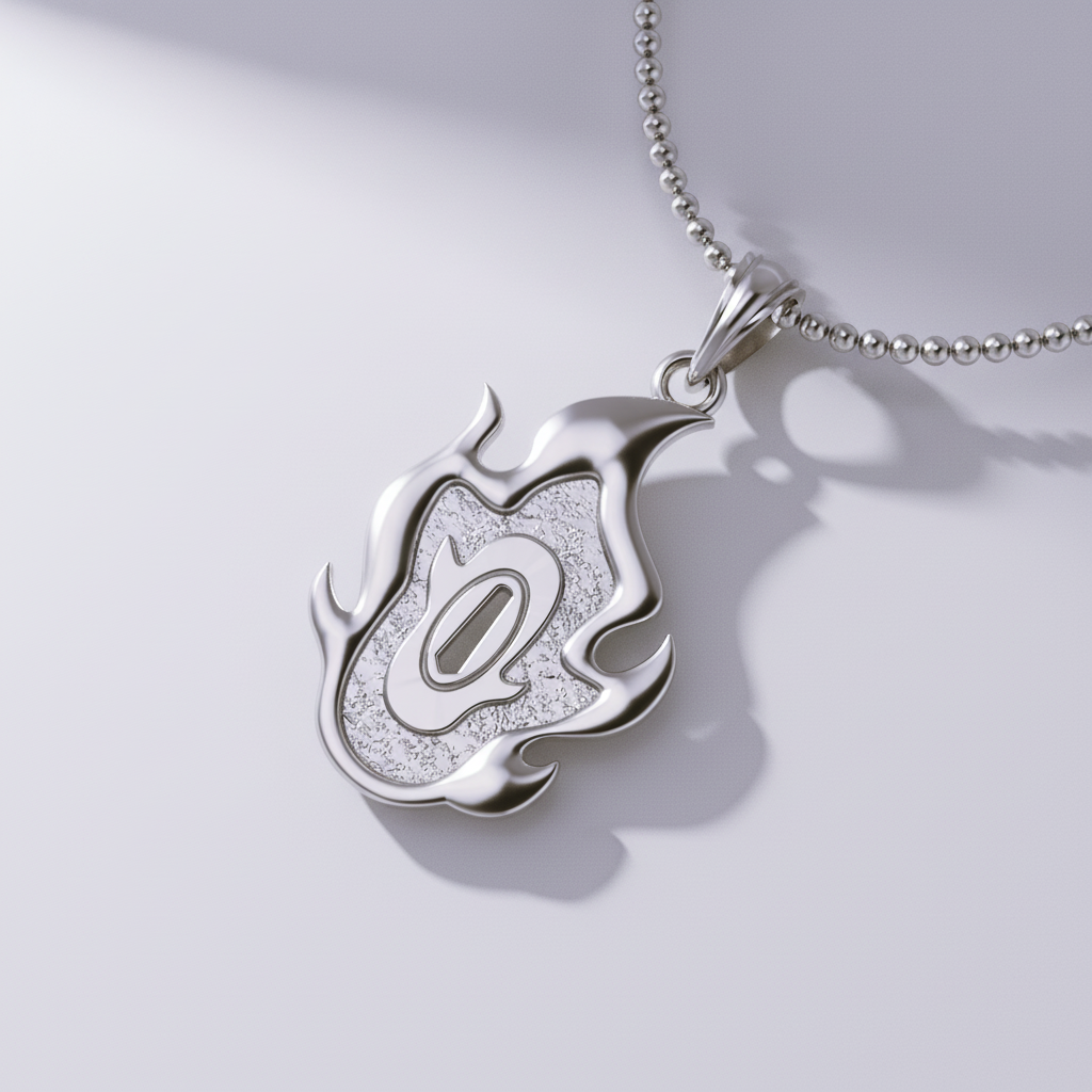 A 14K gold pendant in the shape of a flame-wielding swordsman's handguard with a chain.