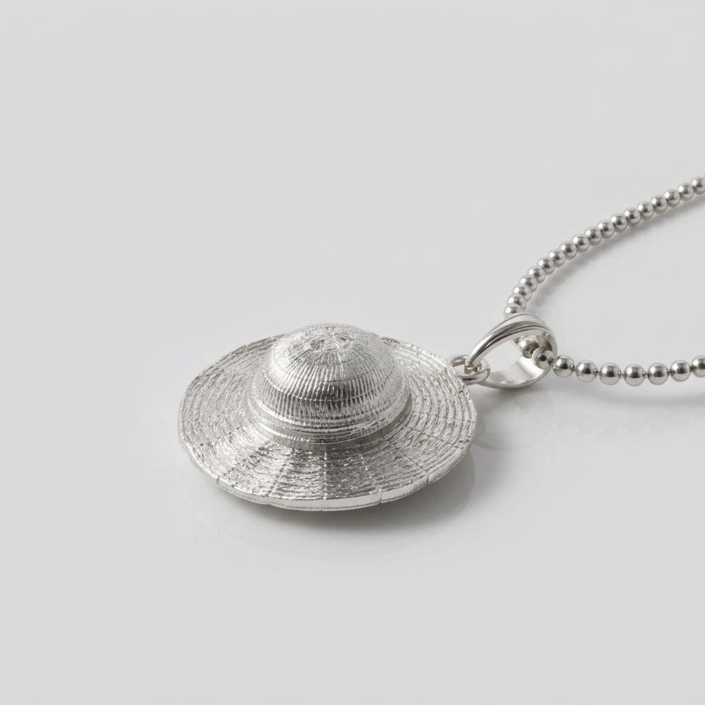 Silver hat-shaped pendant on a chain against a white background
