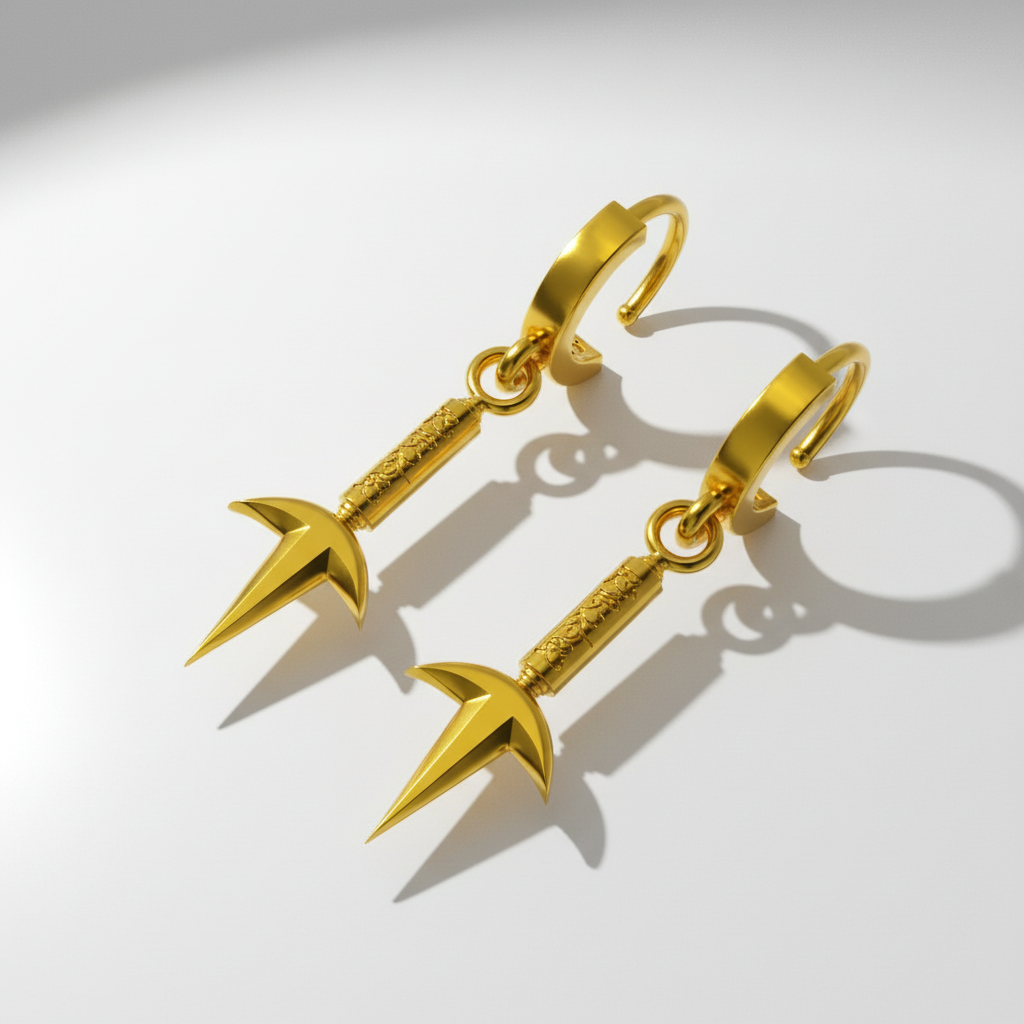 A pair of silver hoop design kunai earrings against a blurred background featuring elements associated with anime.