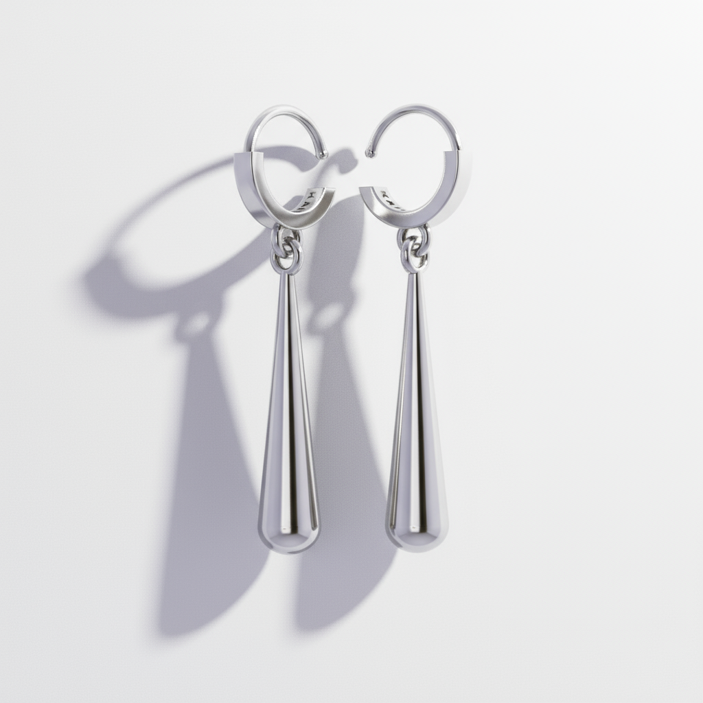 A set of three gold-colored earrings with a sword motif, placed on a wooden surface.