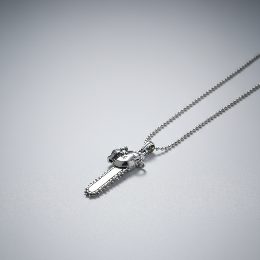 Silver chain necklace with a unique pendant on a gray background
