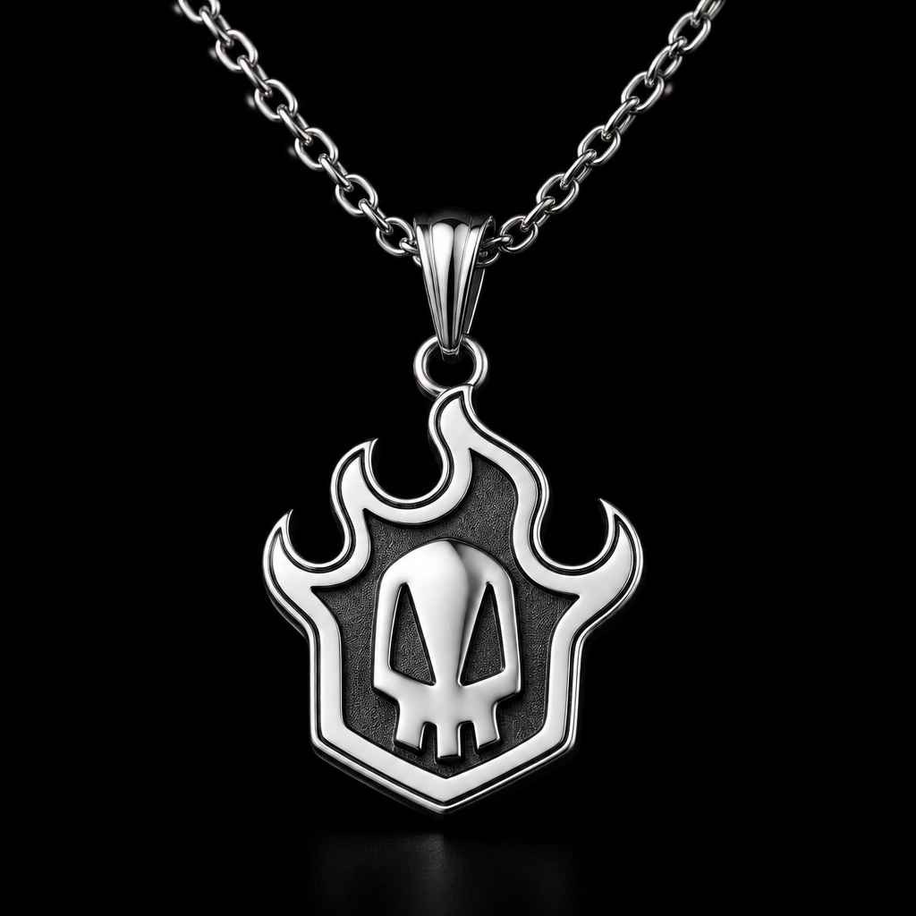 A silver pendant necklace with a flame-shaped outline and a skull design in the center, displayed inside a black jewelry box with the brand name KAIWORKS visible on the inside lid.