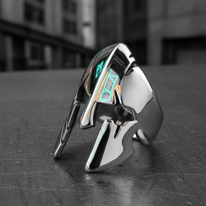 Silver ring with a unique design on a gray background