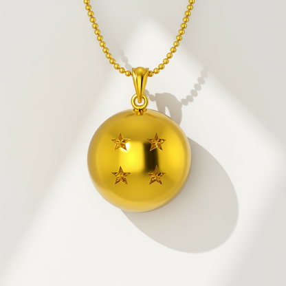 Gold necklace with a spherical pendant featuring star designs on a light gray background