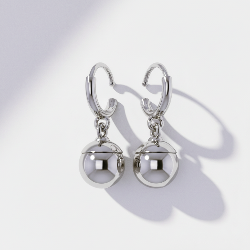 Pair of silver earrings on a white background