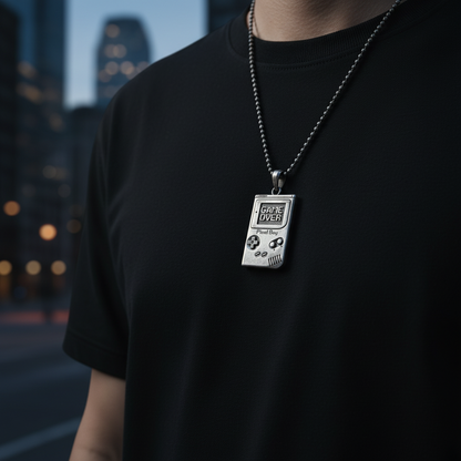 Person wearing a black t-shirt with a 'Game Over' necklace against a blurred cityscape background