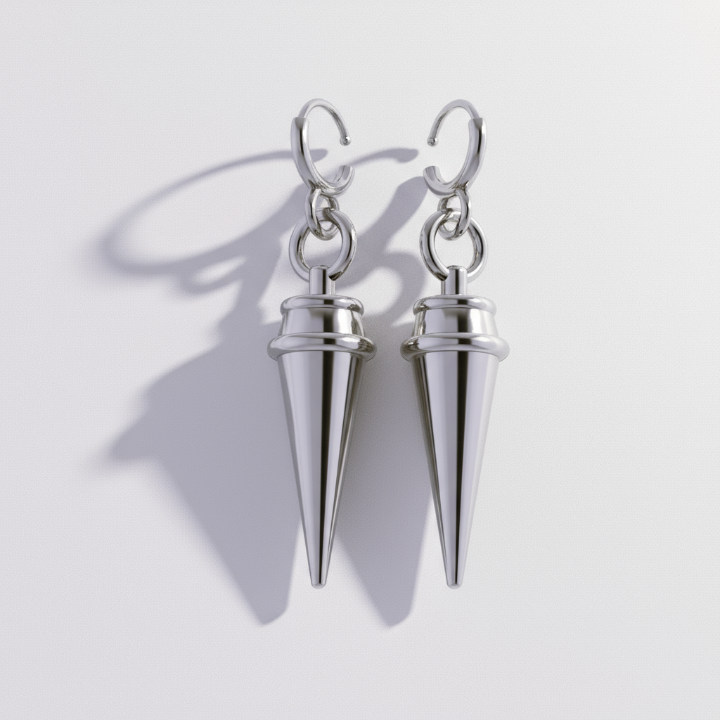 A pair of yellow gold hoop design earrings against a dark background featuring anime-style character illustrations.