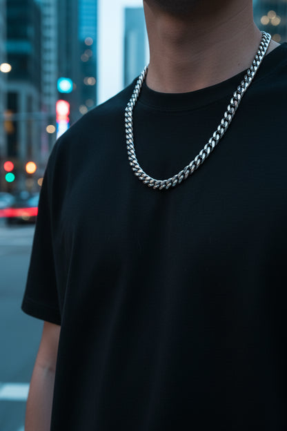 Silver chain necklace on a white background