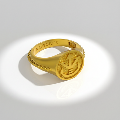 Gold ring with 'KAIWORKS' branding on a gray background