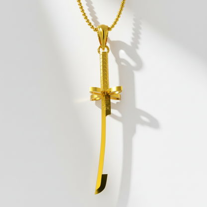 Gold sword-shaped pendant on a white background