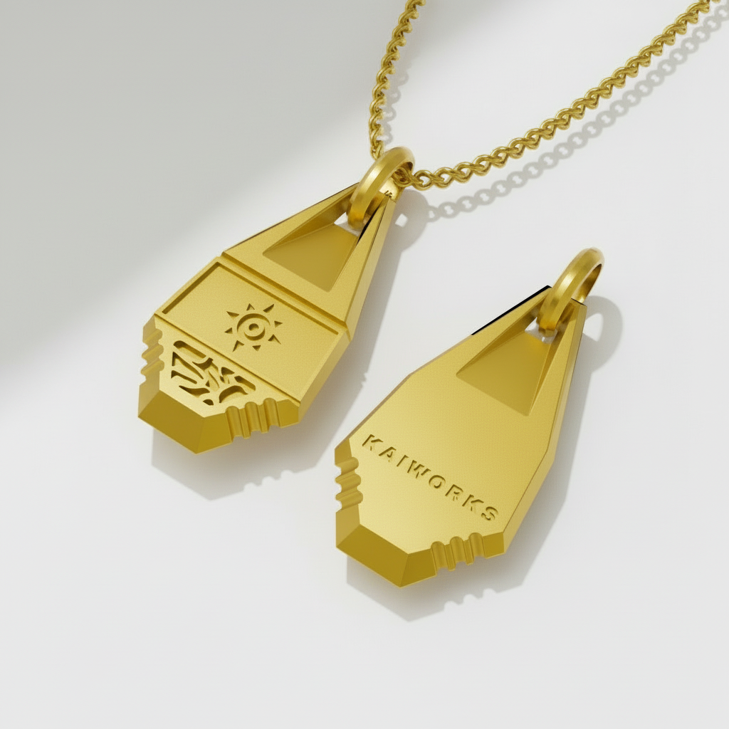 Gold pendant with 'Kaiworks' branding on a white background