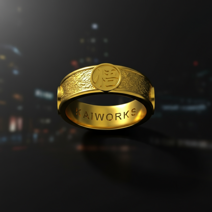 Gold ring with embossed design and 'KATWORX' branding on a white background