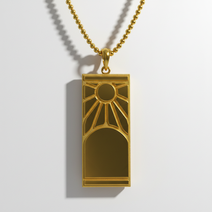 Gold pendant necklace on a white background