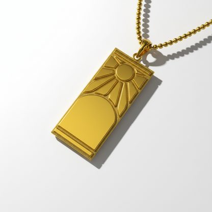 Gold pendant with sun design on a white background