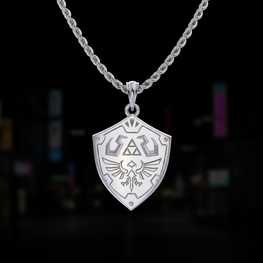 Silver necklace with a shield pendant on a white background