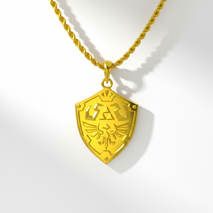 Gold necklace with a shield pendant on a white background