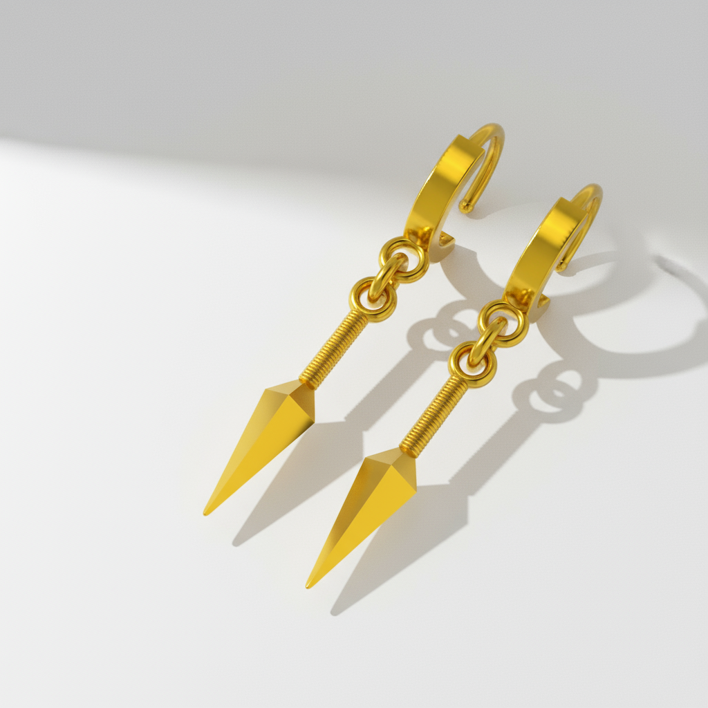 A pair of 14K gold kunai earrings with a polished silver and 18K yellow gold plating, displayed on a wooden surface with a plant in the background.