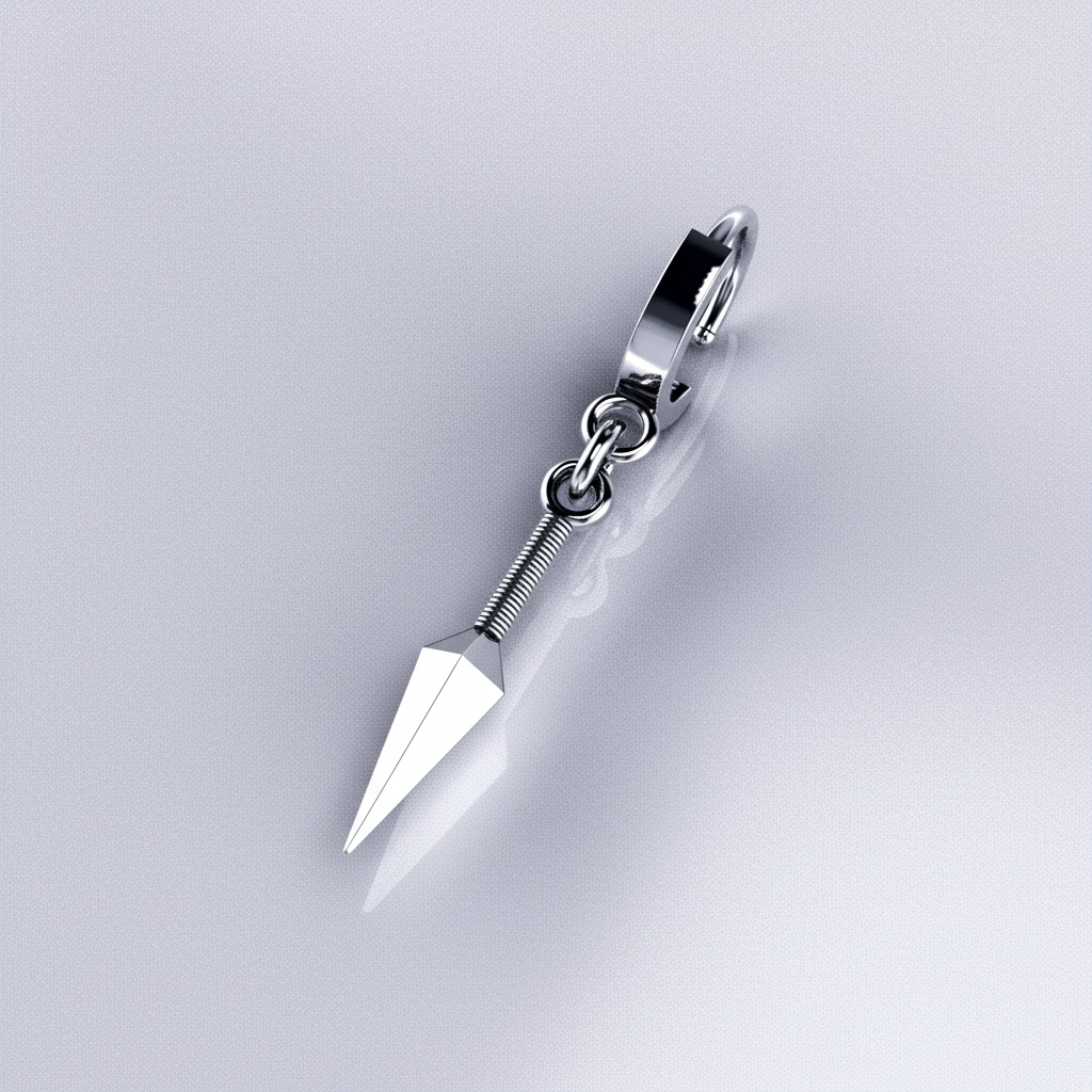 A pair of silver hoop earrings with a pointed tip design resembling a kunai, placed on a wooden surface with a leafy background.