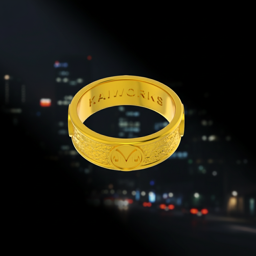 Gold ring with 'KAIWORKS' branding on a white background