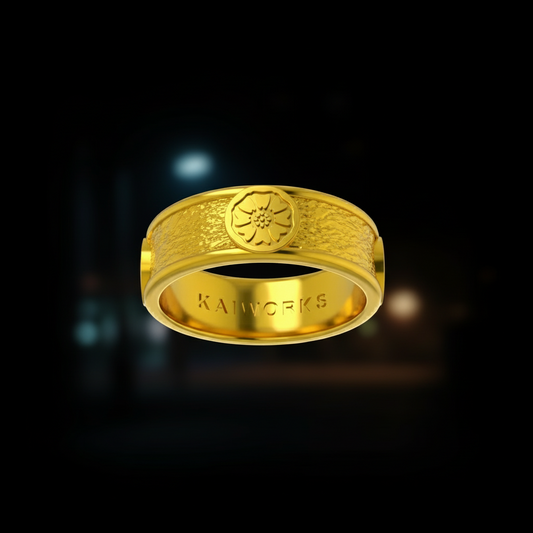 Gold ring with intricate design and 'KAWORKS' branding on a white background
