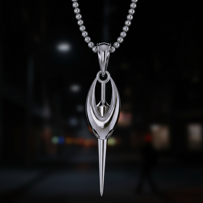 Silver pendant necklace on a dark background