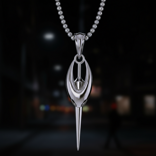 Silver pendant necklace on a dark background